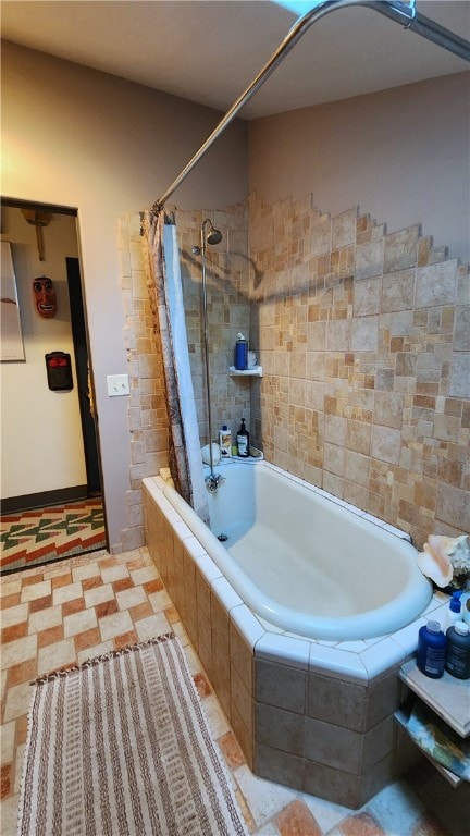 bathroom with shower / bathtub combination with curtain