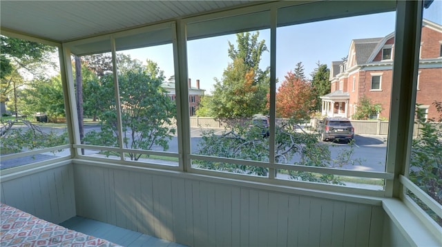 unfurnished sunroom with radiator