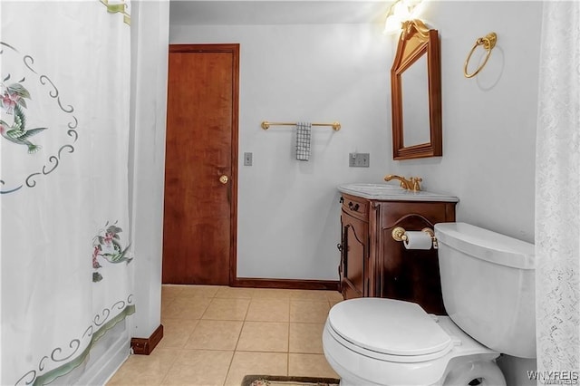 bathroom featuring vanity, toilet, tile patterned floors, and a shower with shower curtain