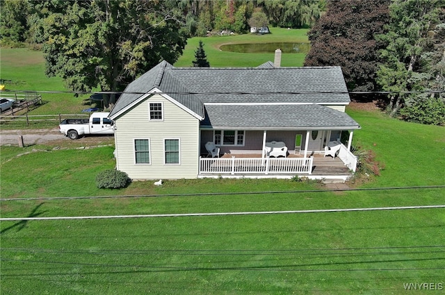 view of front of house featuring a front lawn and a porch