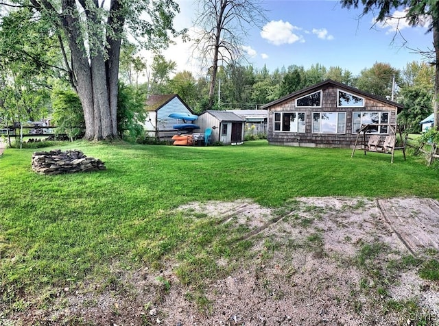 view of yard featuring a wooden deck