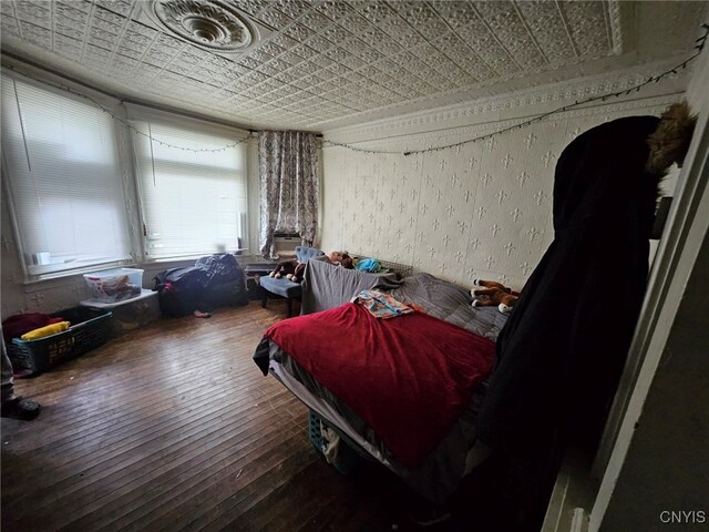 bedroom featuring hardwood / wood-style floors