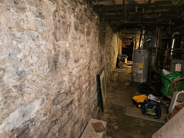 basement featuring gas water heater