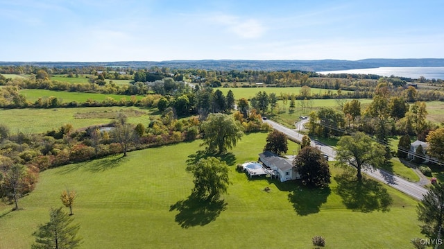 birds eye view of property with a rural view