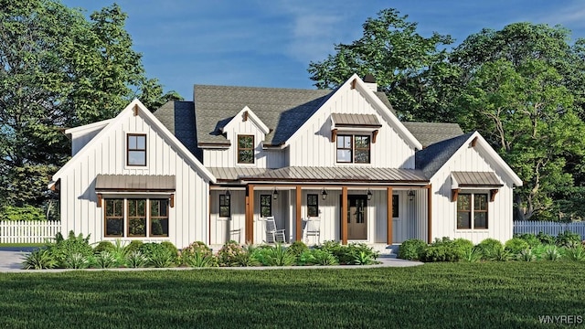 modern farmhouse style home with a front lawn and a porch