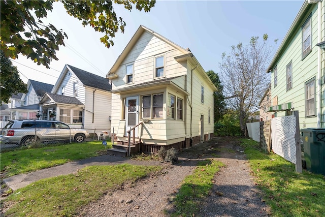 bungalow with a front lawn