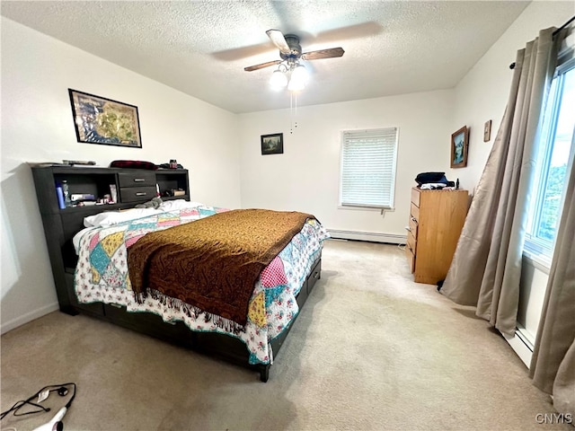 bedroom with a textured ceiling, light colored carpet, ceiling fan, and baseboard heating