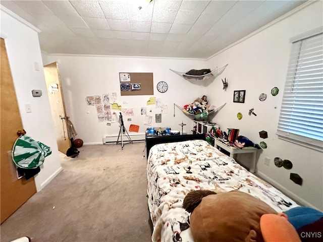 carpeted bedroom with a baseboard radiator and ornamental molding