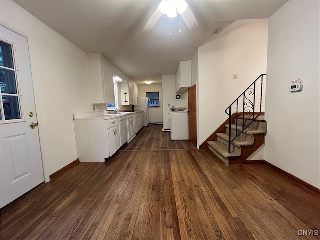 kitchen featuring ceiling fan, sink, dark wood-type flooring, white cabinetry, and dishwasher