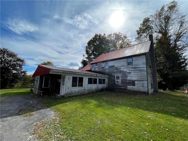 exterior space with a front yard