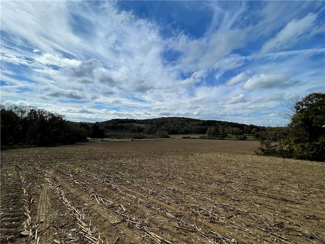 property view of mountains featuring a rural view