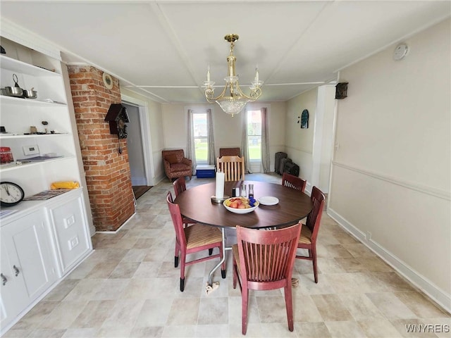 dining room with a notable chandelier