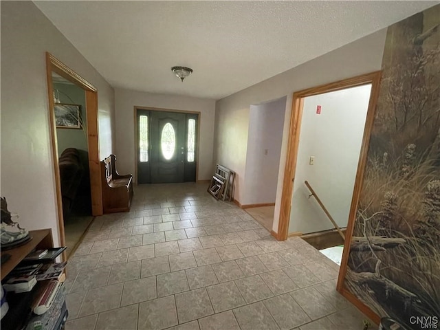 entrance foyer with light tile patterned floors