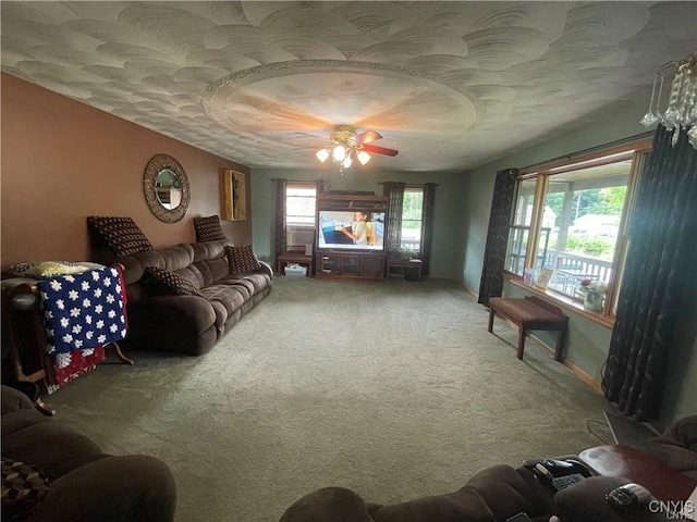 living room with carpet floors and ceiling fan