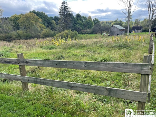 exterior space with a rural view