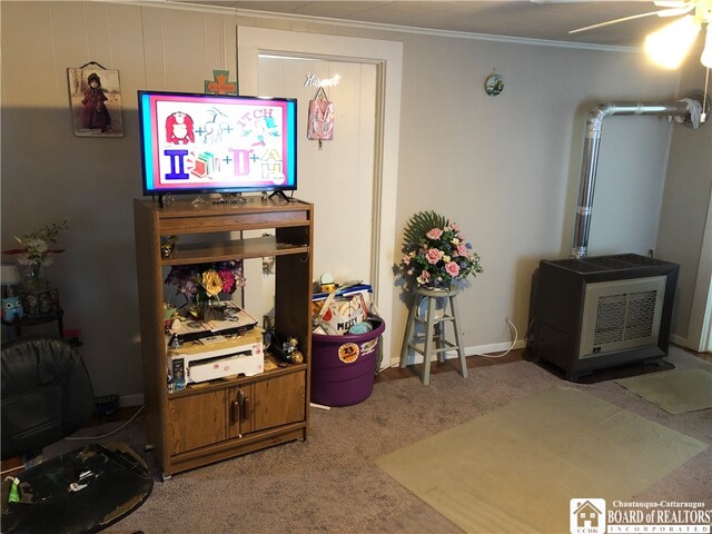 carpeted living room with crown molding