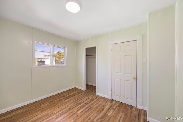 unfurnished bedroom featuring wood-type flooring