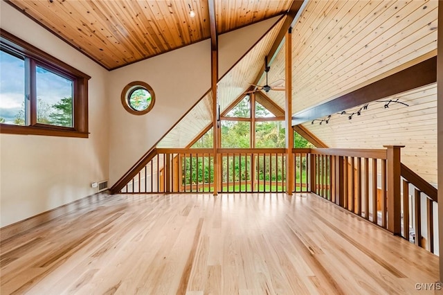 interior space featuring hardwood / wood-style flooring, ceiling fan, plenty of natural light, and wooden ceiling