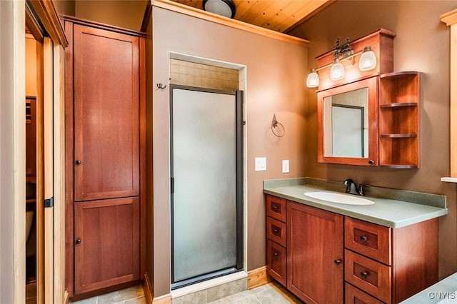 bathroom with vanity, walk in shower, and wood ceiling