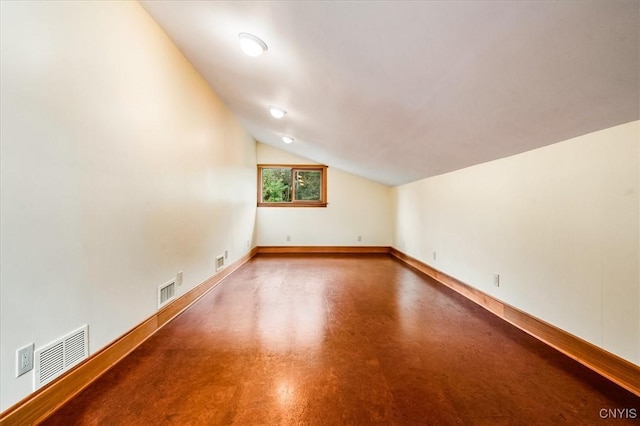 additional living space with lofted ceiling