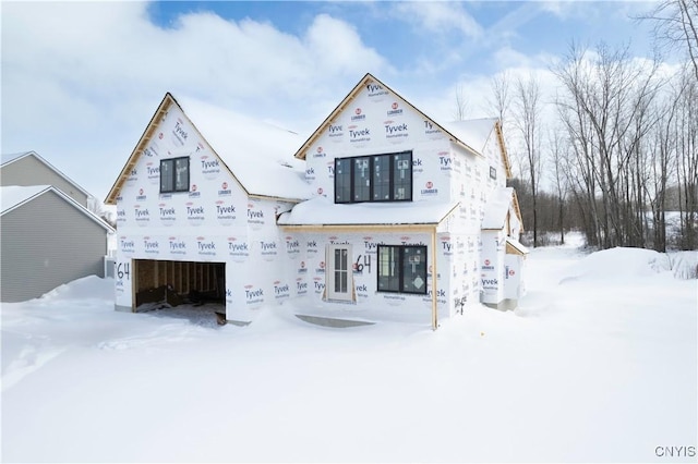 property in mid-construction with an attached garage