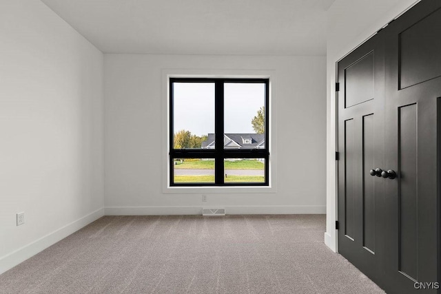 LOT64 Chillingham Way, Lysander, NY 13027 - unfurnished bedroom with multiple windows, carpet floors, and baseboards