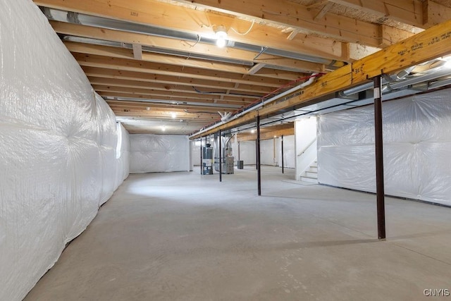 LOT64 Chillingham Way, Lysander, NY 13027 - unfinished basement with gas water heater and stairs