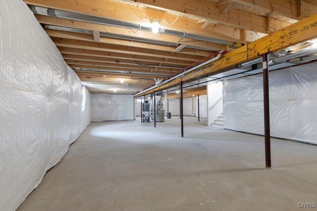 basement featuring gas water heater