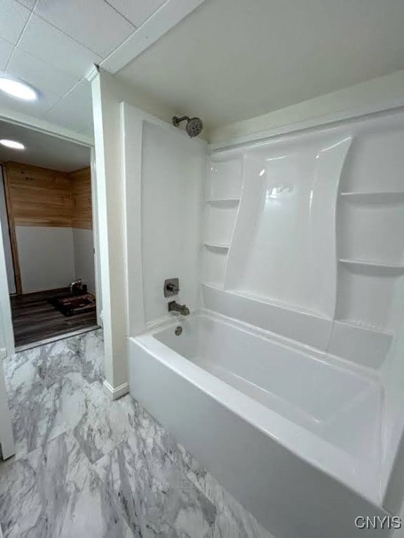 bathroom featuring  shower combination