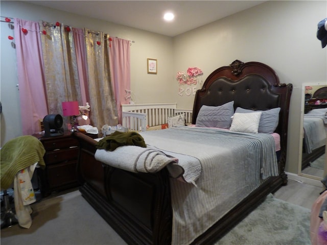 bedroom featuring light wood-type flooring