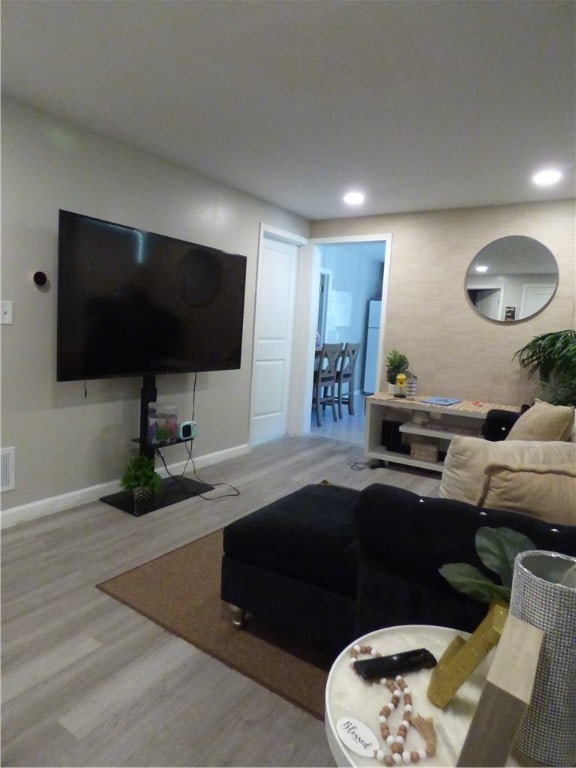 living room featuring hardwood / wood-style flooring