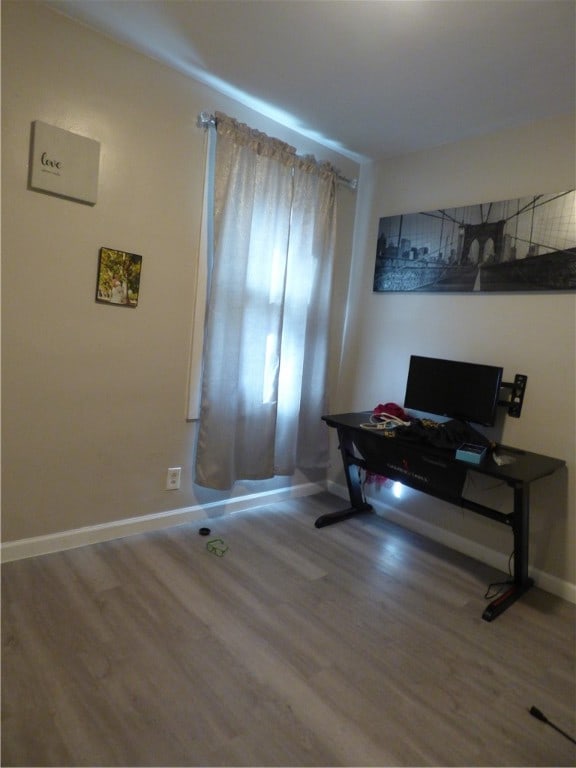 office area with wood-type flooring