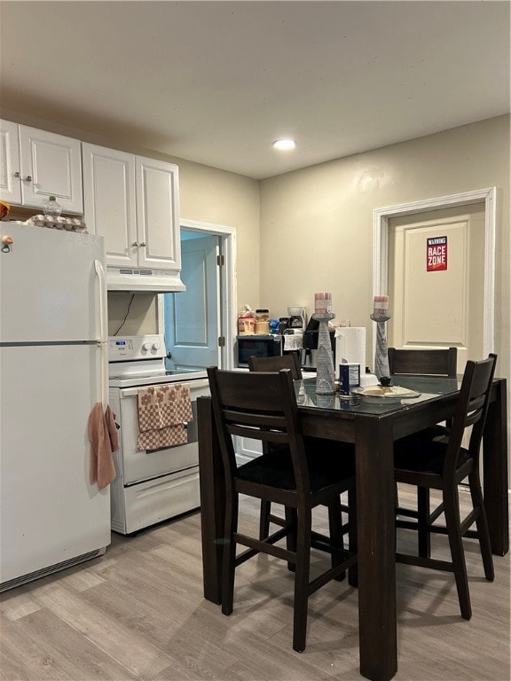 dining room featuring light hardwood / wood-style flooring