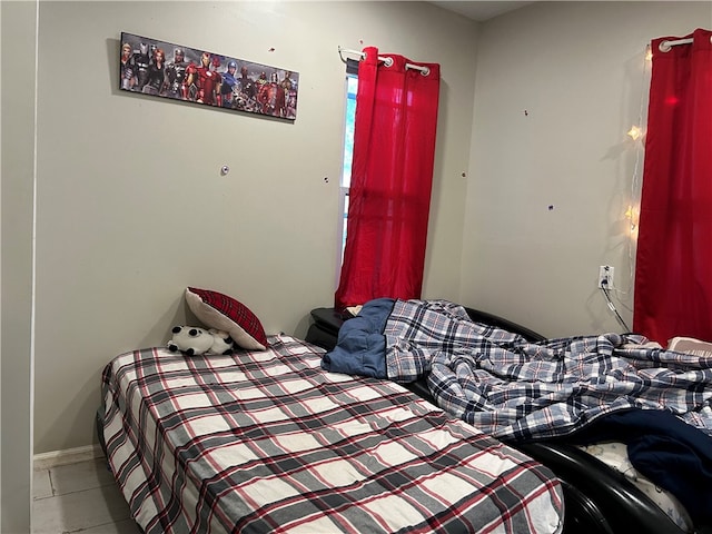 bedroom with tile patterned flooring