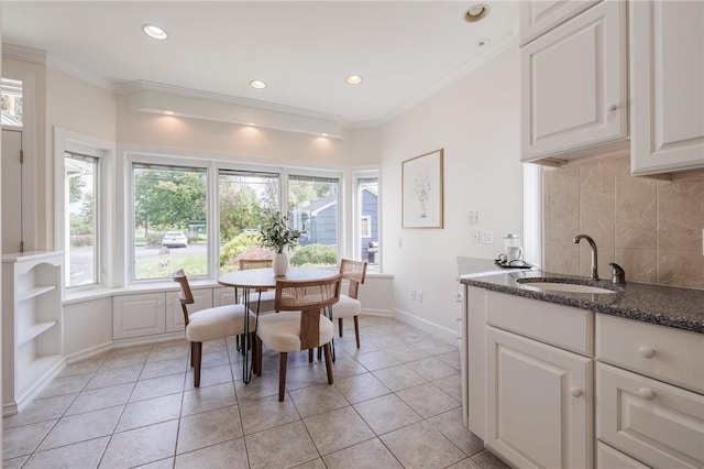 dining area with light tile patterned flooring, recessed lighting, baseboards, and ornamental molding