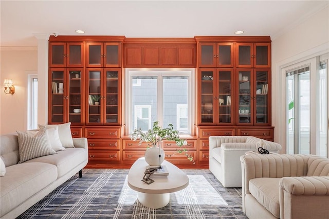 living area featuring dark wood finished floors, recessed lighting, and ornamental molding