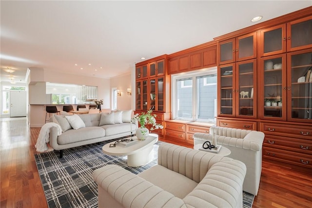 living room with recessed lighting and wood finished floors