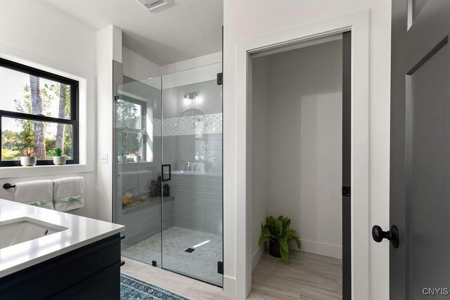 LOT68 Stoney Pond Way, Lysander, NY 13027 - bathroom featuring vanity and a shower with shower door