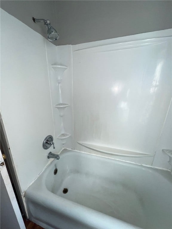 bathroom featuring washtub / shower combination