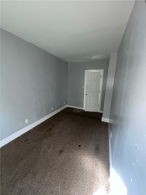 spare room featuring carpet floors