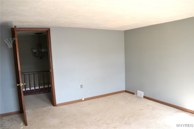 view of carpeted spare room