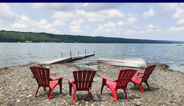 view of dock with a water view