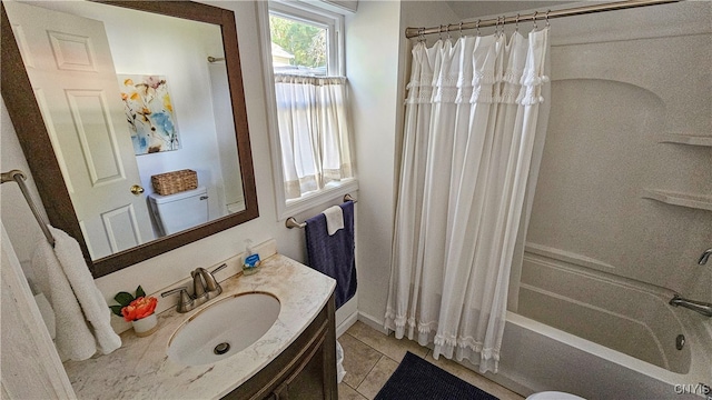 bathroom with vanity, tile patterned floors, and shower / tub combo