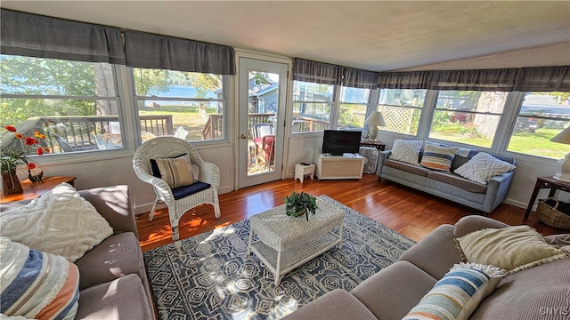 sunroom / solarium with lofted ceiling