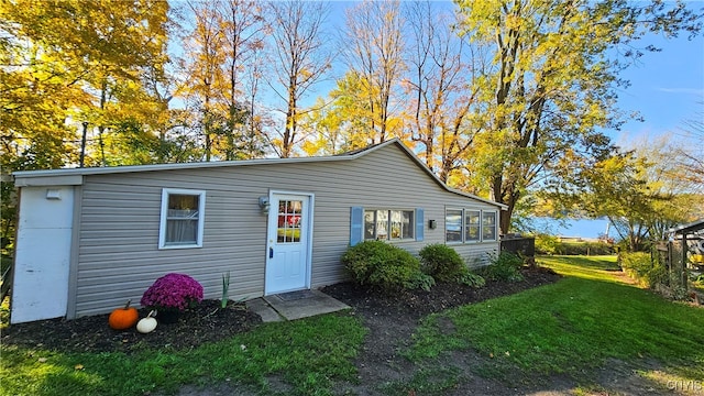 exterior space with a front lawn