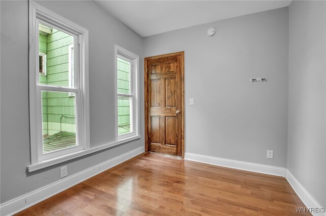 767 W Ave, Buffalo, NY 14213 - unfurnished room featuring light wood finished floors, baseboards, and a smoke detector