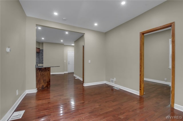767 W Ave, Buffalo, NY 14213 - empty room with dark wood-type flooring, baseboards, and recessed lighting