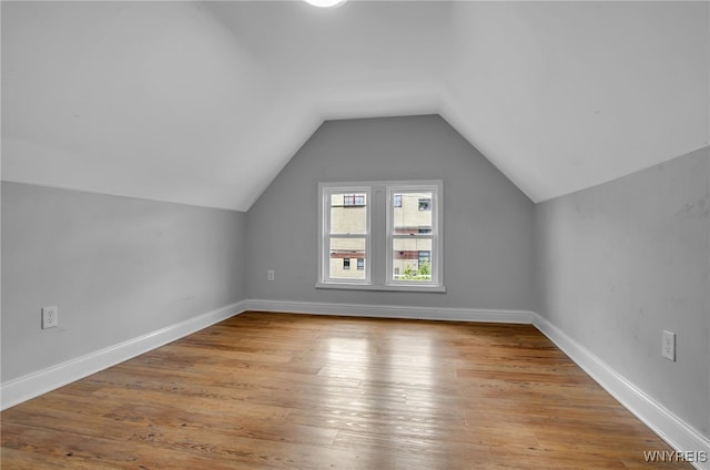 767 W Ave, Buffalo, NY 14213 - bonus room featuring lofted ceiling, wood finished floors, and baseboards