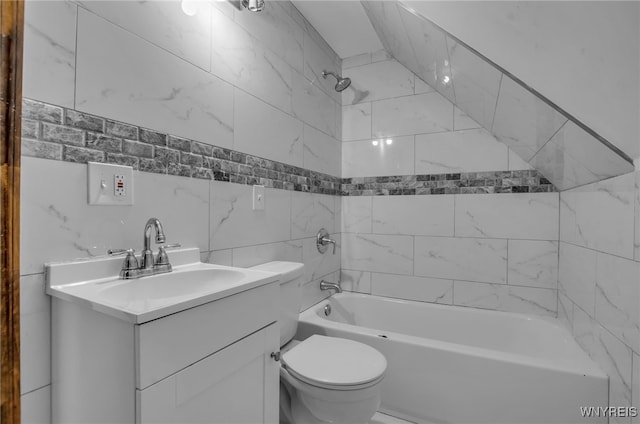 767 W Ave, Buffalo, NY 14213 - full bath featuring shower / bathtub combination, toilet, vanity, and tile walls