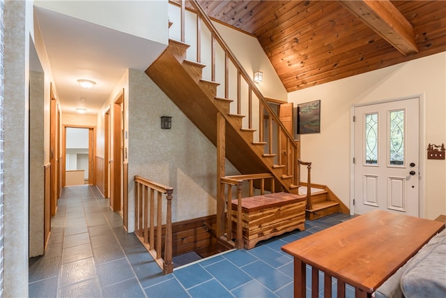 entryway featuring vaulted ceiling and wooden ceiling